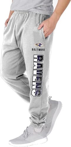 NFL Kids Youth 8-20 Officially Licensed Primary Team Logo Stripe Fleece Lined Football Sweatpants Joggers Pants